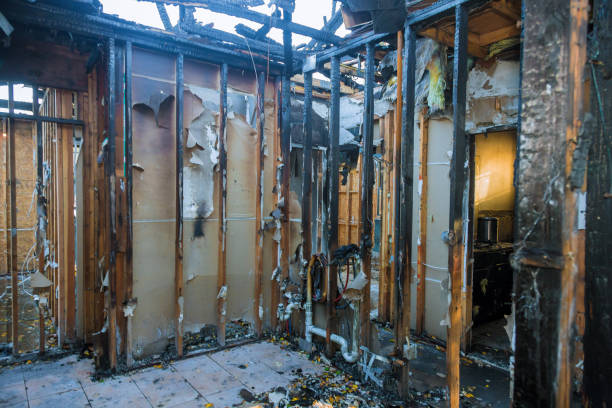 Professional Fire Damage Restoration technician working in Newburg, WI